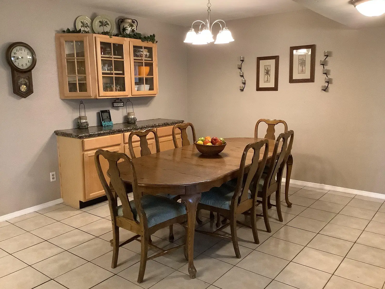 the house's dining room with a table and six chairs